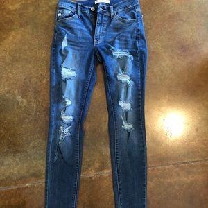Distressed, skinny blue jeans